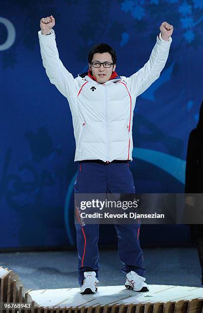 Joji Kato of Japan celebrates winning the bronze medal during the medal cermony for the Men's 500m Speed Skating on day 5 of the Vancouver 2010...