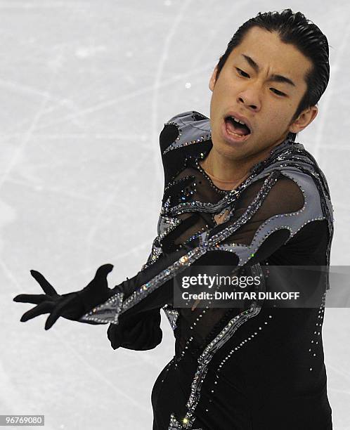 Japan's Nobunari Oda competes in the Figure Skating Men's short program, at the Pacific Coliseum, in Vancouver during the XXI Winter Olympics on...