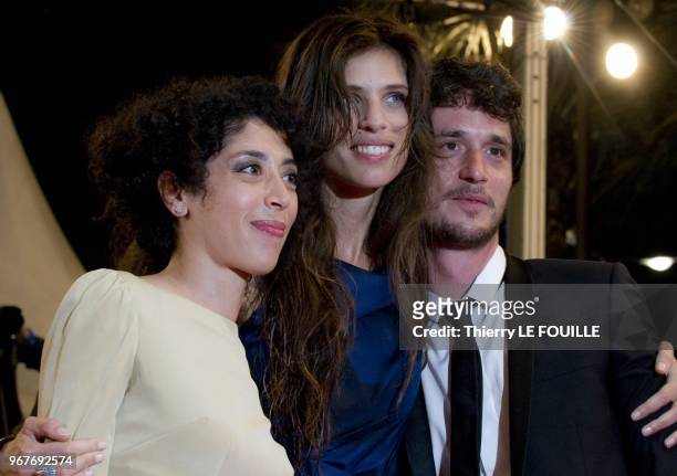 May 13:Actress Naidra Ayadi and director/actress Maiwenn and actor Jeremie Elkaim arrive at the 'Polisse' premiere during the 64th Annual Cannes Film...