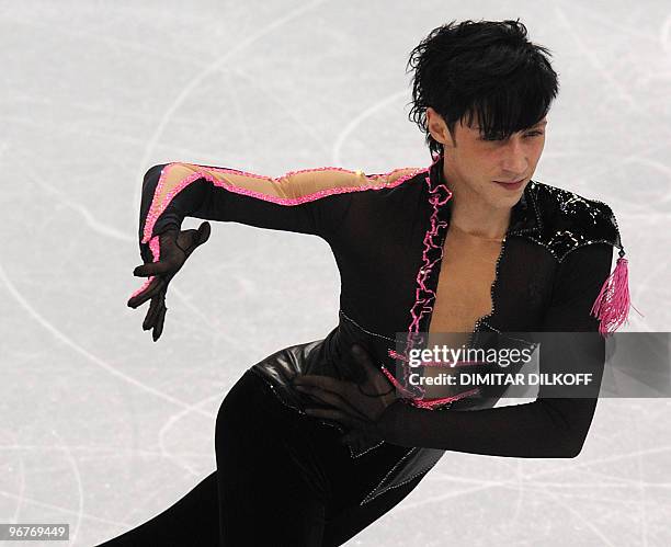 Johnny Weir competes in the Figure Skating Men's short program, at the Pacific Coliseum, in Vancouver during the XXI Winter Olympics on February 16,...
