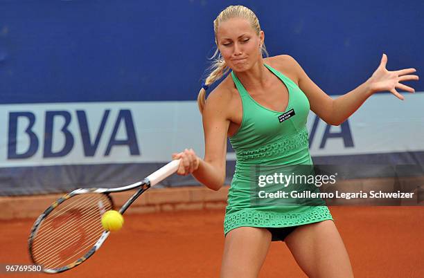 Ukrainean tennis player Kristina Antoniychuk returns a ball during her match against Carla Suarez of Spain as part of the WTA Bogota Tennis Tour on...