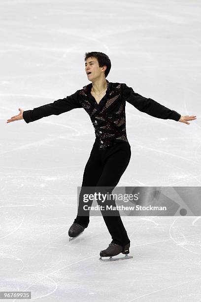 Patrick Chan of Canada competes in the men's figure skating short program on day 5 of the Vancouver 2010 Winter Olympics at the Pacific Coliseum on...