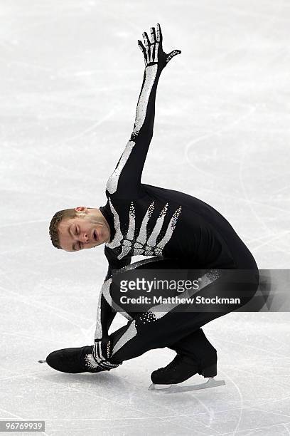 Kevin van der Perren of Belgium reacts in the men's figure skating short program on day 5 of the Vancouver 2010 Winter Olympics at the Pacific...