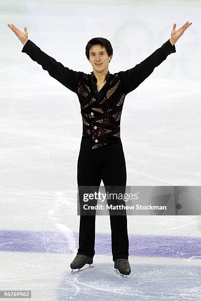 Patrick Chan of Canada competes in the men's figure skating short program on day 5 of the Vancouver 2010 Winter Olympics at the Pacific Coliseum on...