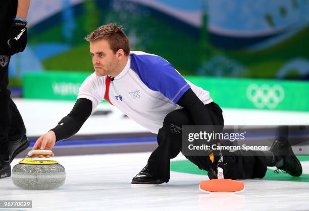 Tony Angiboust of France releases the stone during the men's curling round robin game bewteen China and France on day 5 of the Vancouver 2010 Winter...