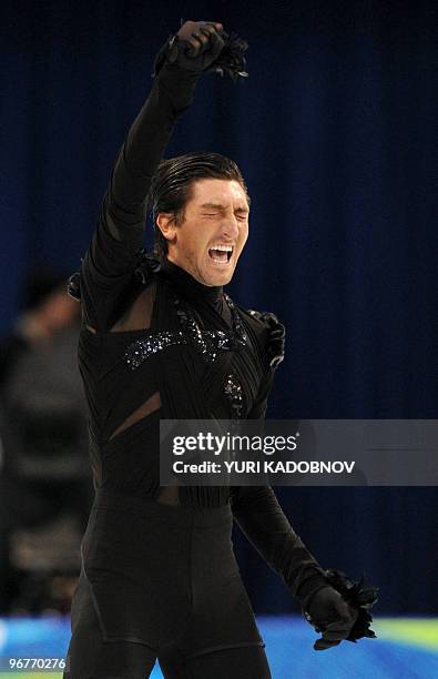 Evan Lysacek of the US celebrates after competing in the men's 2010 Winter Olympics figure skating short program at the Pacific Coliseum in Vancouver...