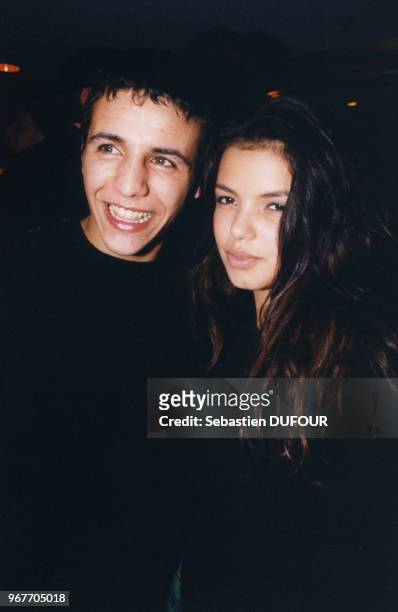 Le chanteur Faudel et Séverine Ferrer dans la boîte de nuit "le VIP Room" le 14 janvier 1999 à Paris, France.