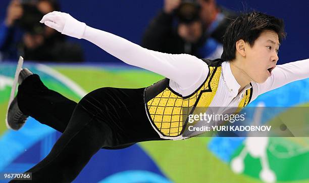 Kazakh's Denis Ten performs in his Figure Skating men's short program at the Pacific Coliseum in Vancouver during the 2010 Winter Olympics on...