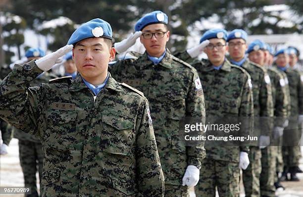 South Korean soldiers salute during a ceremony marking the formation of the unit for dispatch to Haiti on February 17, 2010 in Incheon, South Korea....