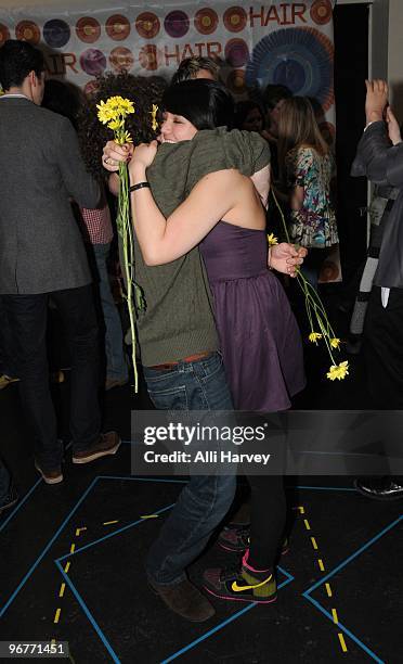 Actors Larkin Bogan and Cailan Rose attend a photo call for the new cast of Broadway's "HAIR" at The Hilton Theater on February 16, 2010 in New York...