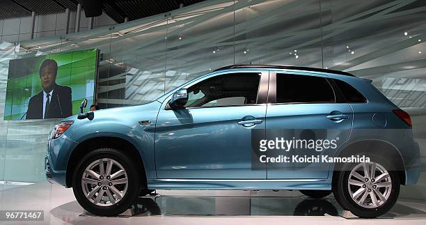 Mitsubishi Motors Corporation President Osamu Masuko introduces their new compact SUV "RVR" at their headquarters on February 17, 2010 in Tokyo,...