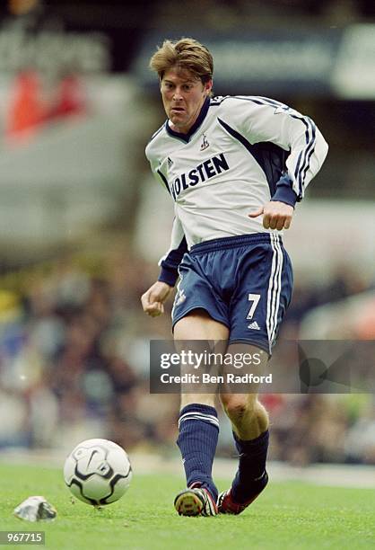 Darren Anderton of Tottenham Hotspur passes the ball during the FA Barclaycard Premiership match against Southampton played at White Hart Lane, in...