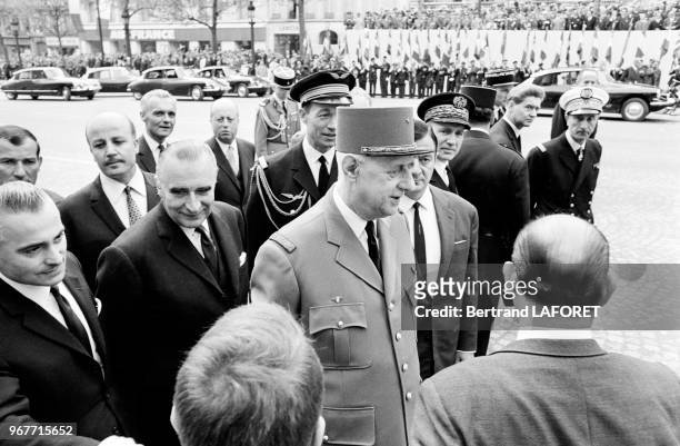 Le Général de Gaulle et le Premier ministre Georges Pompidou lors des cérémonies du 14-Juillet 1967 à Paris, France.