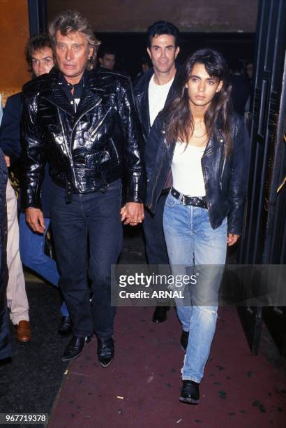 Johnny Hallyday et Adeline Blondieau lors d'une soirée au Palace le 15 septembre 1989 à Paris, France.