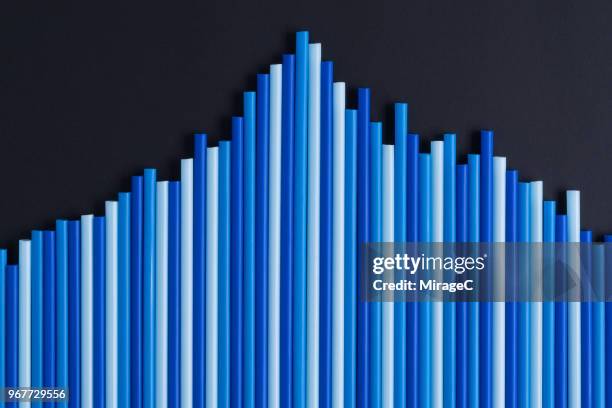 blue bar graph peak value - protruding ストックフォトと画像