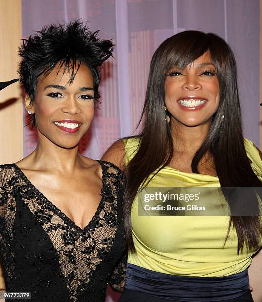 Michelle Williams and Wendy Williams pose on the set of "The Wendy Williams Show" on February 16, 2010 in New York City.