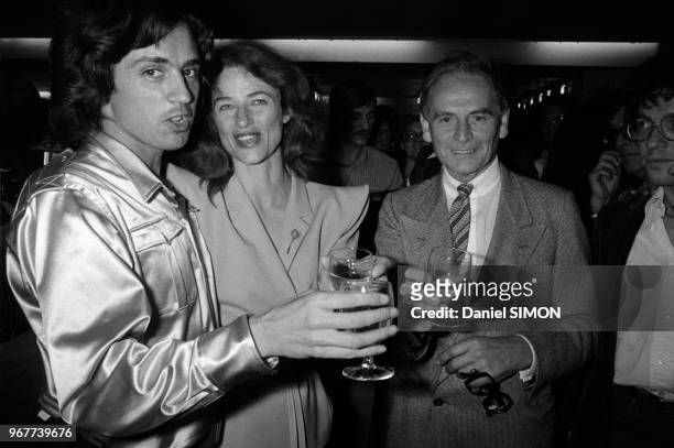 Jean-Michel Jarre, Charlotte Rampling et Pierre Cardin après le concert donné par le musicien Place de la Concorde le 14 juillet 1979 à Paris, France.