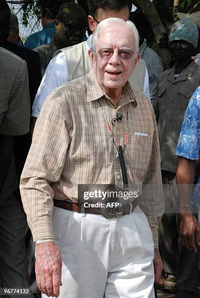 Former US president Jimmy Carter visits the Central Equatorian Sudanese village of Lojura on February 11, 2010. Lojura, a remote settlement in the...