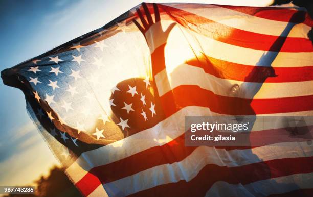 freedom and love in the usa - american flags imagens e fotografias de stock