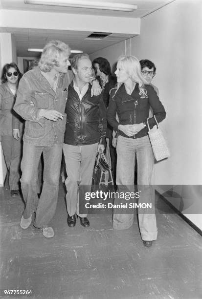 Johnny Hallyday,Sylvie Vartan and Guy Lux and arrive at the TV recording studio.