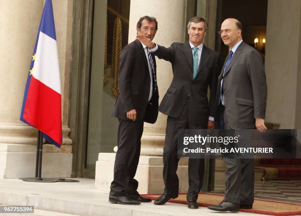 Outgoing French Budget Minister Jerome Cahuzac with Finance Minister Pierre Moscovici during the first weekly cabinet meeting at Elysee Palace on May...