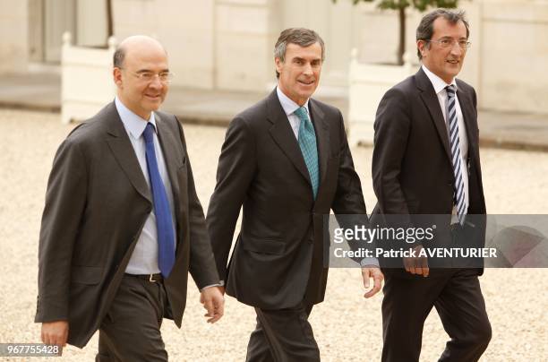 Outgoing French Budget Minister Jerome Cahuzac with Finance Minister Pierre Moscovici during the first weekly cabinet meeting at Elysee Palace on May...