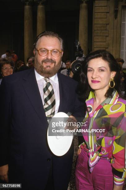 Gianfranco Ferré et Paloma Picasso lors du défilé Dior, collection haute-couture autome/hiver 89, Paris le 24 juillet 1989, France.