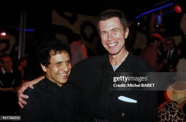 Azzedine Alaïa et Jean-Paul Goude aux Bains Douches, le 22 juillet 1989 à Paris, France.