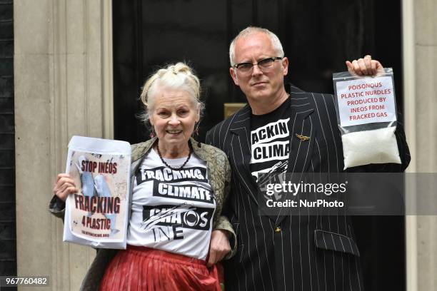 British fashion designer Dame Vivienne Westwood and her son Joe Corre stage an anti-fracking protest at Downing Street, London on June 5, 2018. The...