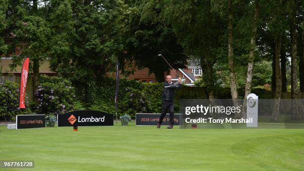 Stephen Banks of Wergs Golf Club plays his first shot on the 1st tee during The Lombard Trophy Midland Qualifier at Little Aston Golf Club on June 5,...