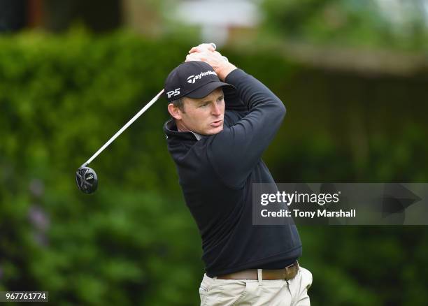 Robert Steele of Evesham Golf Club plays his first shot on the 1st tee during The Lombard Trophy Midland Qualifier at Little Aston Golf Club on June...