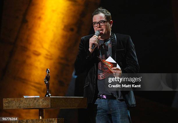Alan Carr presents the award for Best British single on stage at The Brit Awards 2010 at Earls Court on February 16, 2010 in London, England.