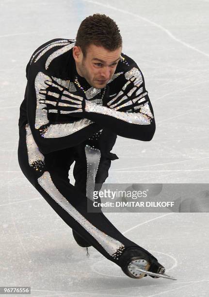 Belgium's Kevin van der Perren competes in the men's 2010 Winter Olympics figure skating short program at the Pacific Coliseum in Vancouver on...