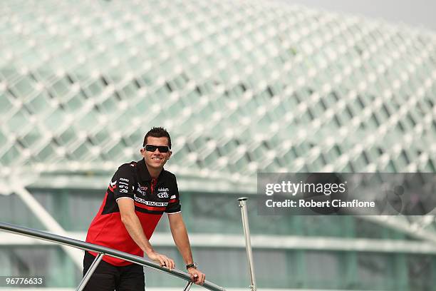 Garth Tander driver of the Toll Holden Racing Team Holden tours the Yas Marina during previews for round one of the V8 Supercar Championship Series...