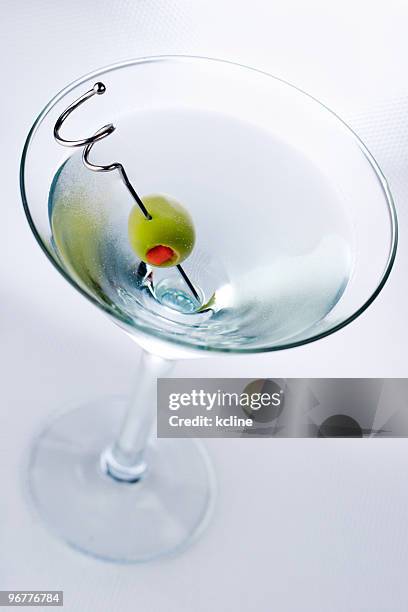 cool martini - olive pimento stock pictures, royalty-free photos & images