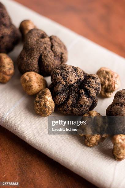 truffles on linen - ascomycete stock pictures, royalty-free photos & images
