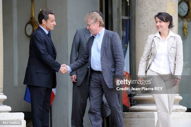 Daniel Cohn-Bendit et Cécile Duflot avec Nicolas Sarkozy sur le péron de l'Elysée le 18 juin 2009 à Paris, France.