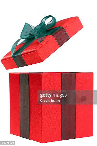 a red gift box with the lid open and a green bow - open bildbanksfoton och bilder