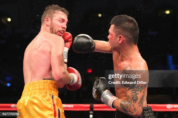 Brian Vera throws a right hand against Andy Lee at Boardwalk Hall in Atlantic City, NJ on October 01, 2011. Lee would win by unanimous decision.