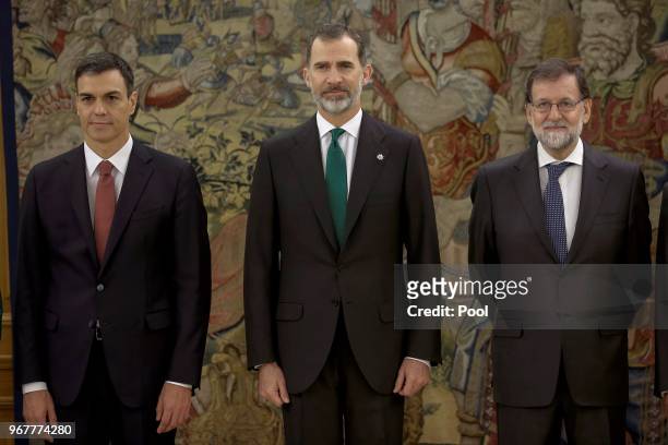 Spain's new Prime Minister Pedro Sanchez, King Felipe VI of Spain and Former Prime Minister Mariano Rajoy pose during the swearing ceremony at the...