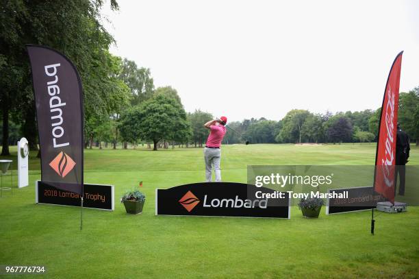 Steve Baxter of Drayton Park Golf Club plays his first shot on the 1st tee during The Lombard Trophy Midland Qualifier at Little Aston Golf Club on...