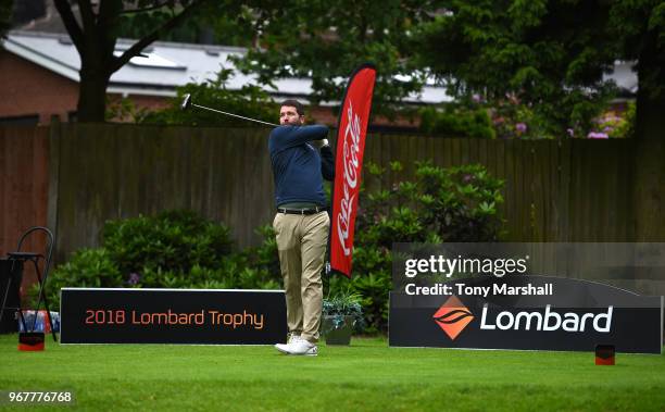 Adam Gray of Kenilworth Golf Club plays his first shot on the 1st tee during The Lombard Trophy Midland Qualifier at Little Aston Golf Club on June...