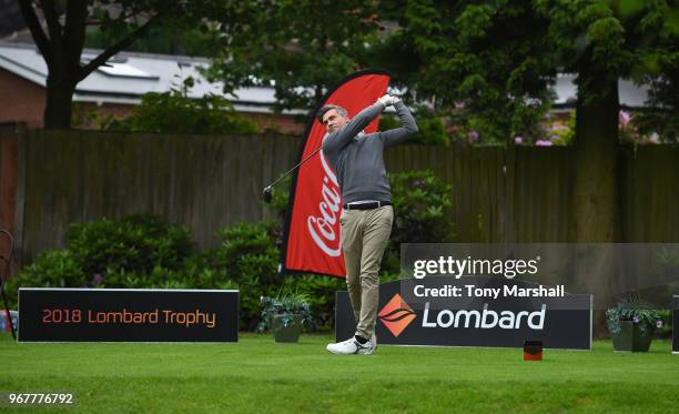 Tom Parker of Kenilworth Golf Club plays his first shot on the 1st tee during The Lombard Trophy Midland Qualifier at Little Aston Golf Club on June...