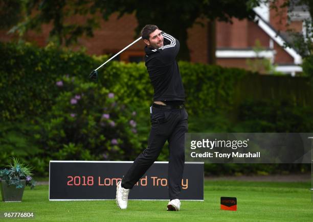 Adam Myers of Northants County Golf Club plays his first shot on the 1st tee during The Lombard Trophy Midland Qualifier at Little Aston Golf Club on...