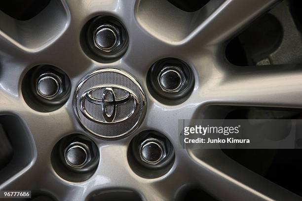 Detail of an alloy wheel with Toyota's logo on a car displayed at the company's Tokyo headquarters on February 17, 2010 in Tokyo, Japan. Toyota...
