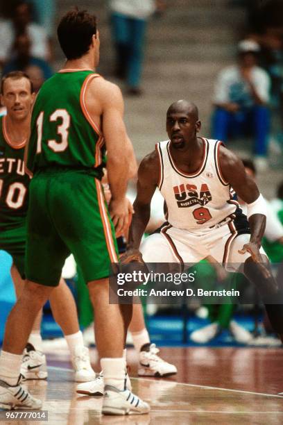 Michael Jordan of the United States plays defense against Lithuania during the 1992 Summer Olympics on August 6, 1992 at the Palau Municipal...