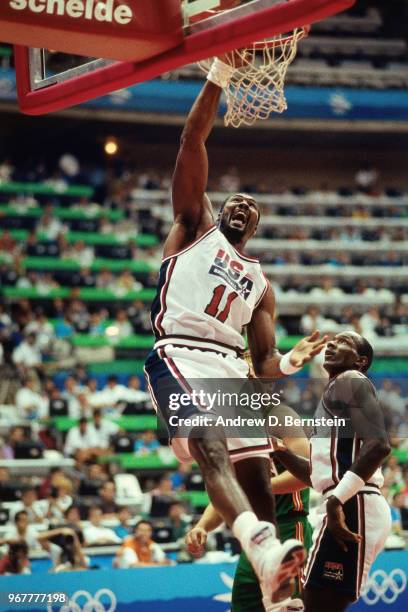 Karl Malone of the United States dunks the ball against Lithuania during the 1992 Summer Olympics on August 6, 1992 at the Palau Municipal d'Esports...