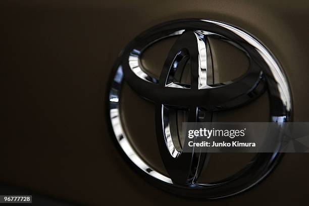 Toyota's logo is seen on a car displayed at the company's Tokyo headquarters on February 17, 2010 in Tokyo, Japan. Toyota promised a brake-override...