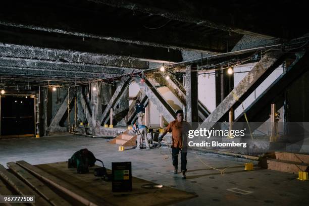 Contractors work during renovations of the Bank of America Plaza building, the former Biltmore Hotel, at 335 Madison Avenue in New York, U.S., on...