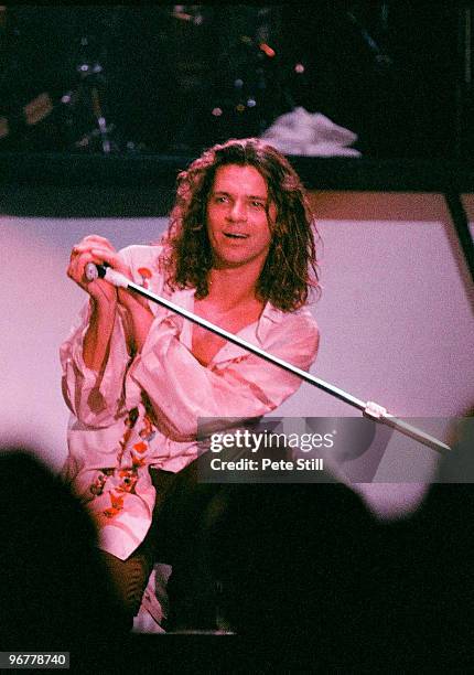 Michael Hutchence of INXS performs on stage on the 'Kick' tour at Wembley Arena on June 24th, 1988 in London, United Kingdom.